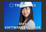 A woman wearing a hard hat for construction, with the text "Amy Software Engineer."